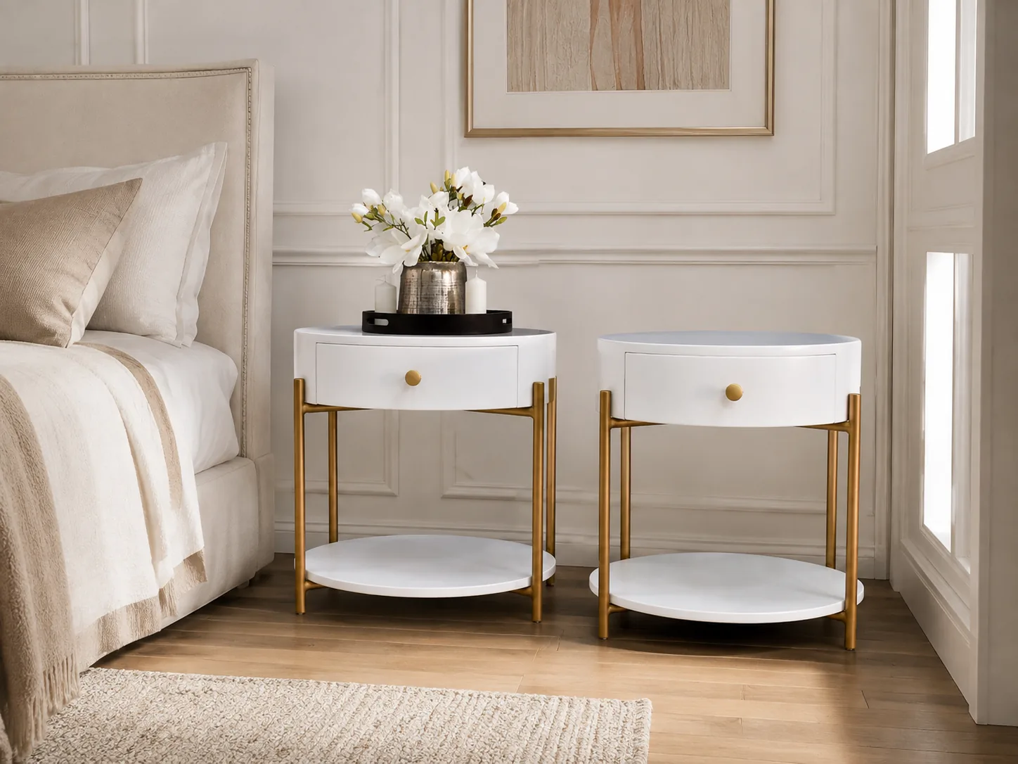 Pair of white nightstands with brass frames and fluted drawers