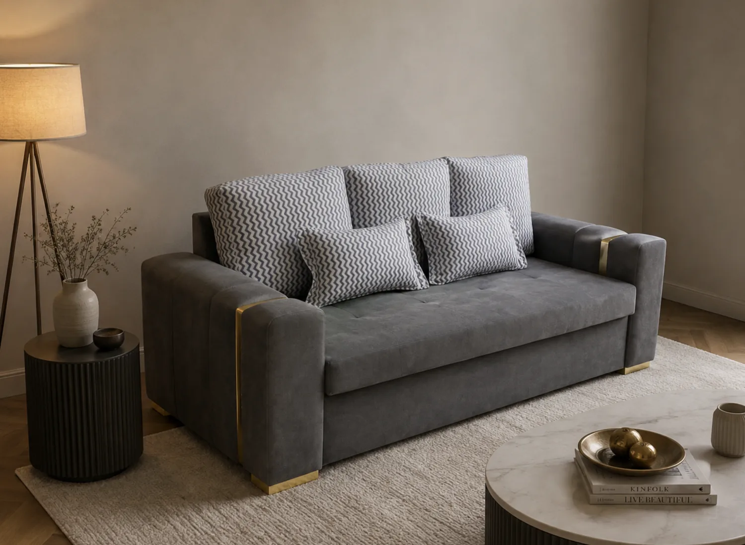 Grey sofa with ribbed scatter cushions and slim metal feet