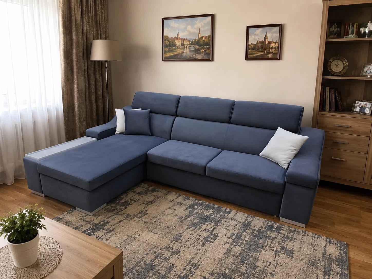 Navy corner sofa with a deep chaise and storage base