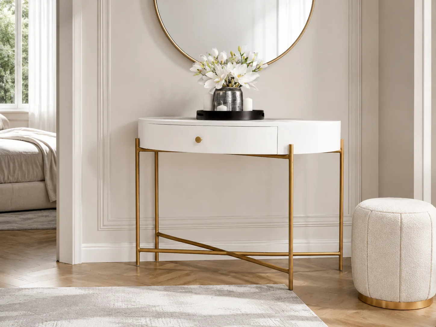 White console table with a brass frame and round mirror