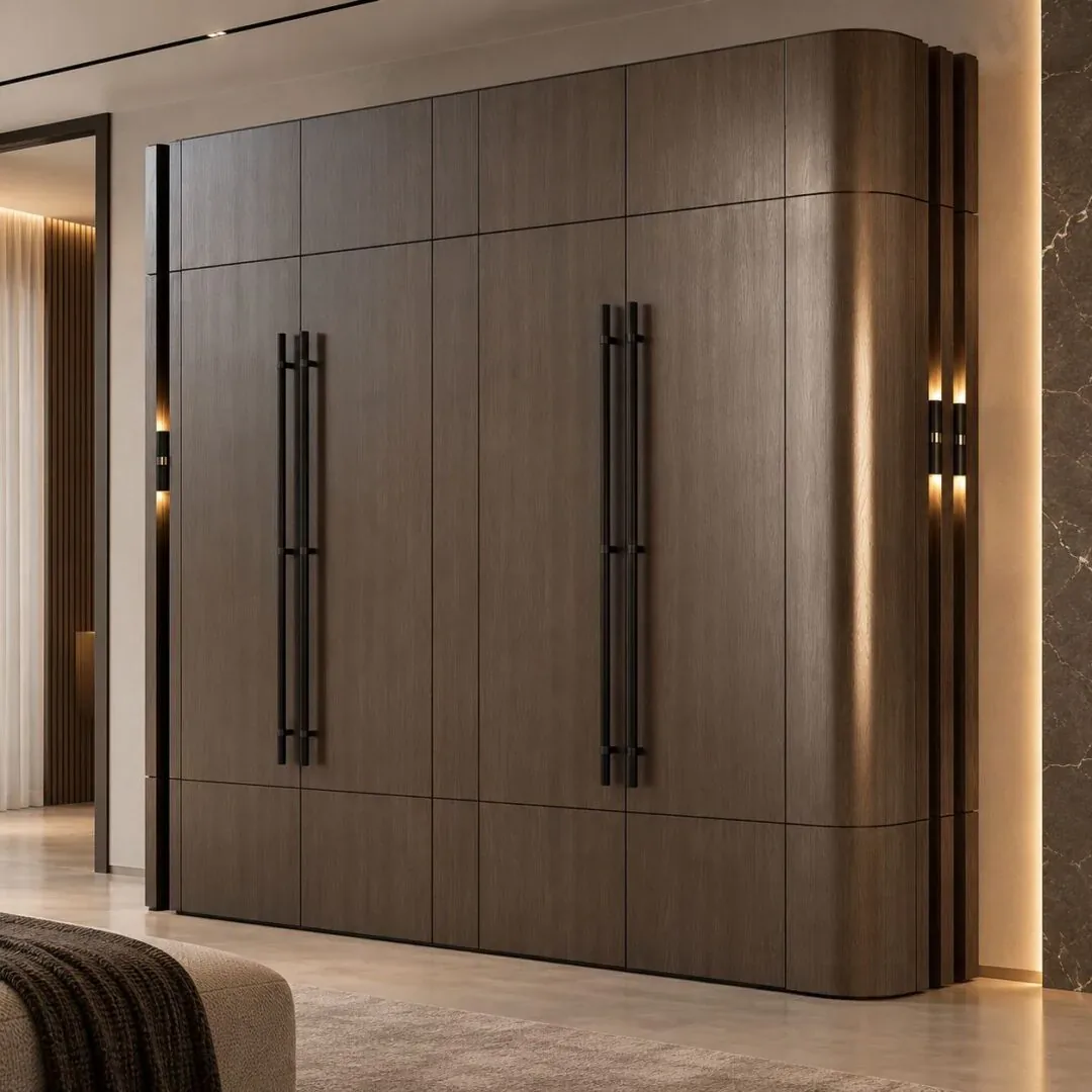 Dark oak wardrobe with a curved end panel and long black bar handles